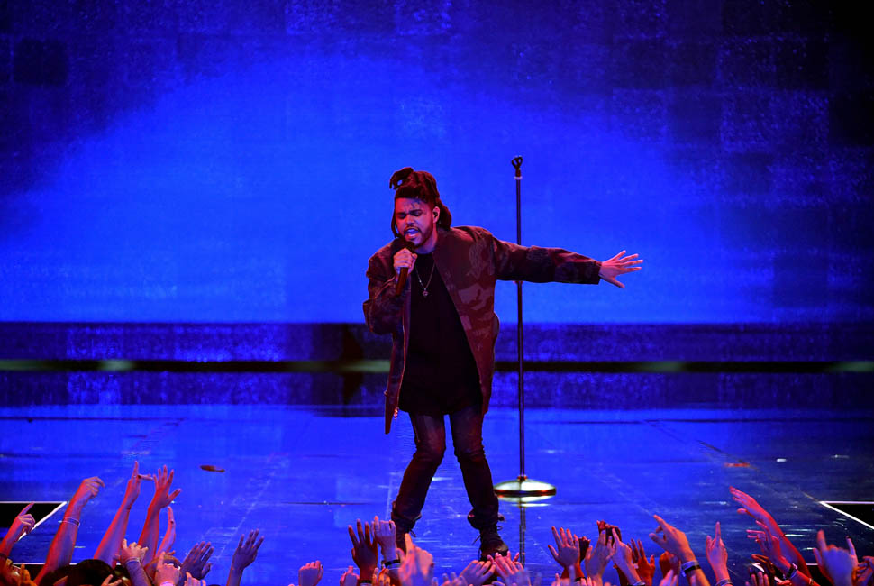 LOS ANGELES, CA - AUGUST 30: Recording artist The Weeknd performs onstage during the 2015 MTV Video Music Awards at Microsoft Theater on August 30, 2015 in Los Angeles, California. (Photo by Kevin Winter/MTV1415/Getty Images For MTV)